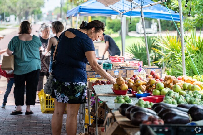 Longwood Farmers Market guests enjoy the large selection of produce.