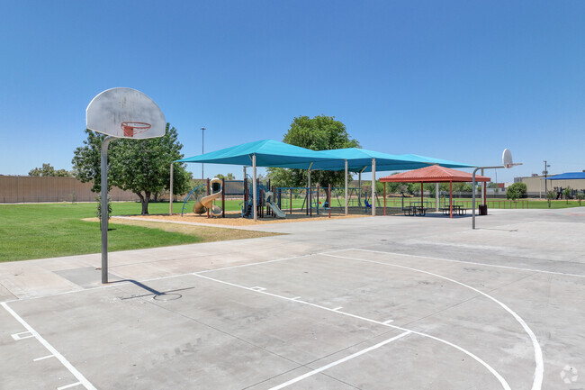Basketball courts are available for students at Excelencia School in Central City Phoenix.