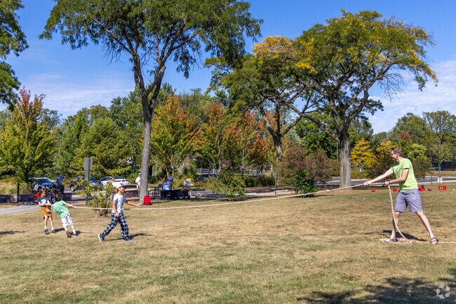 Woodland Park is a 17-acre green space with sports fields, playgrounds, and a walking path.