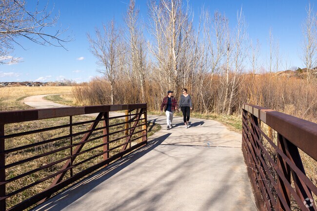 Enjoy a hike with friends and family on the Sand Creek Trail.
