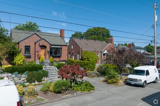 Mid-century brick homes sit on tastefully styled landscaping in Crown Hill.