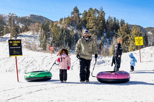 Families enjoy tubing at Woodward near Silver Summit.