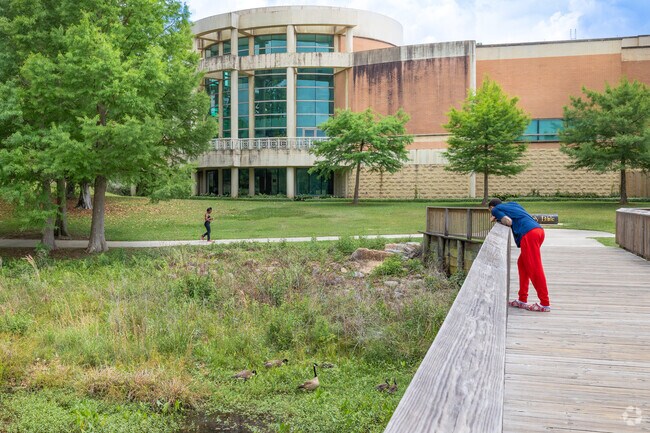 Trails and boardwalks connect Langan Park and the Mobile Art Museum.