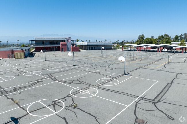 Outdoor basketball courts provided at Cezar Chavez Academy in Corona.