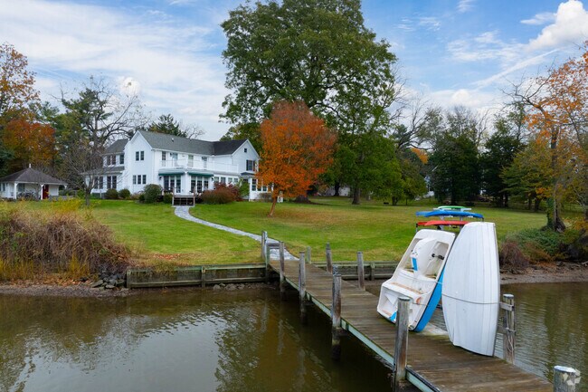 Residents can dock boats and fish along Queenstown’s tranquil shoreline.