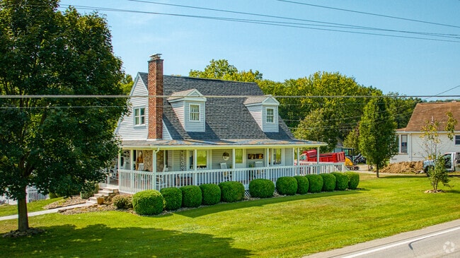 Cape cod home adds country charm to Marion Township.