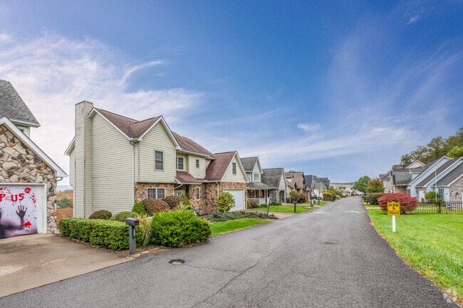 A row of New Traditional homes are lined along the streets of Mileground.