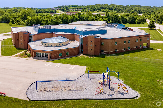 Lansing Intermediate School students enjoy the Leavenworth County outdoors at the playground.