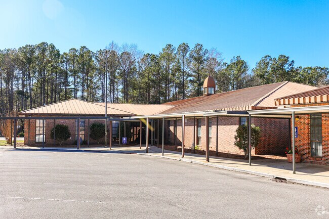 Summerville Apostolic Academy are gifted with shady walkways to escape the sun.