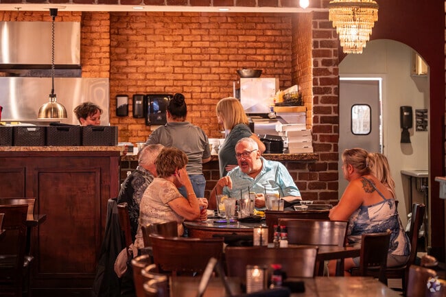 Village of Largo locals enjoy a variety of local eateries such as City Fire.