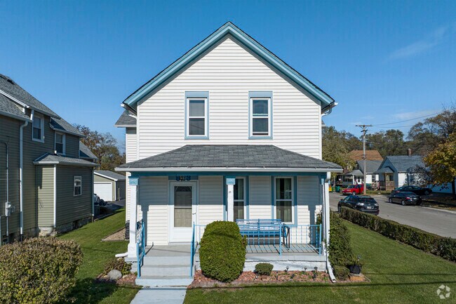Sit on your front porch and enjoy the cool breeze in Northeast Joliet.