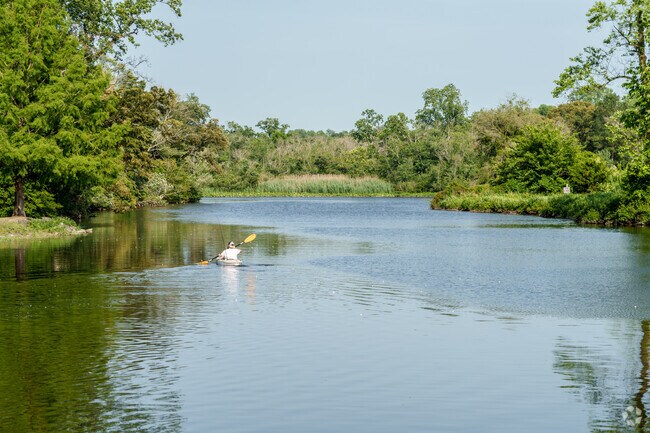A kayaker paddles out to try his luck with fishing on the Broadkill River in Milton Memorial Park.