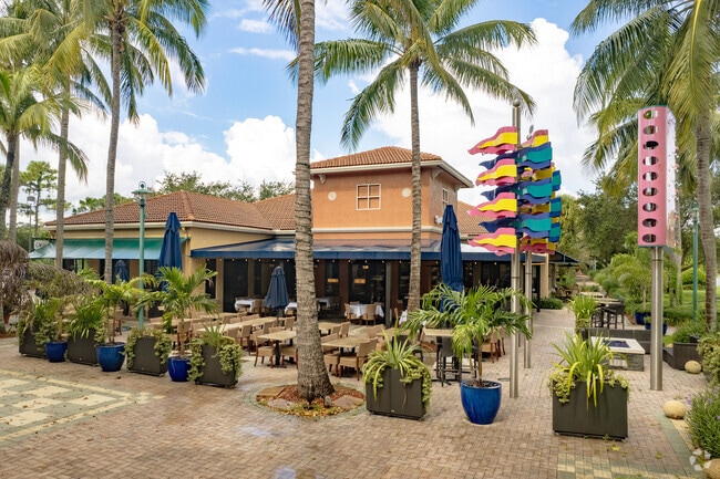 Palm-shaded patios invite diners at PGA Commons.