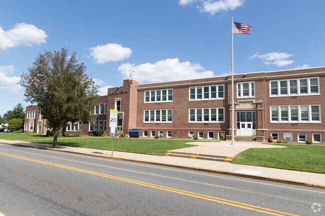 Covert Avenue Elementary School has a grand facade.
