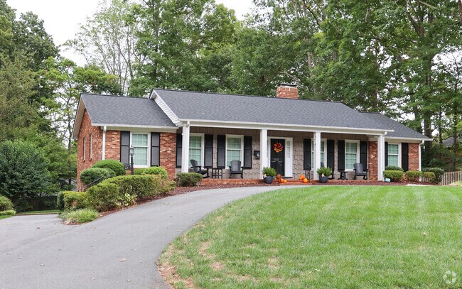 A circular driveway welcomes you to this ranch home in Peace Haven.