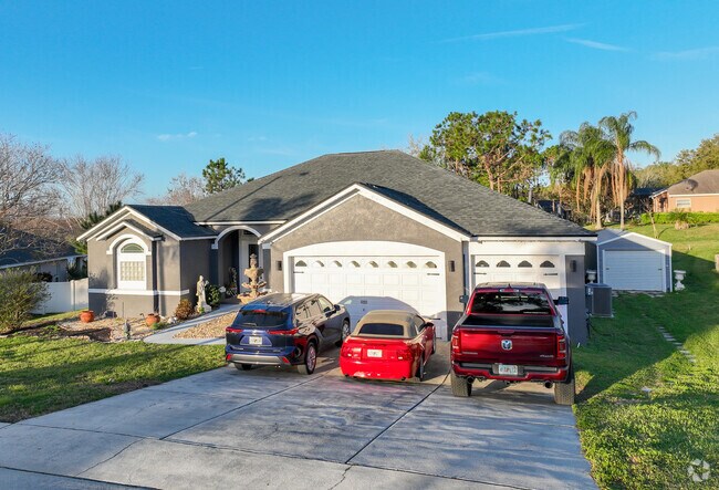 Greater Pines homes employ natural elements like brick and stone.