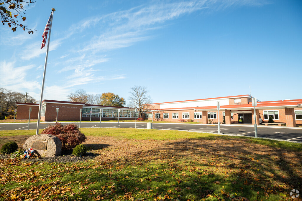 Killingly Memorial School is surrounded by trees and greenery.
