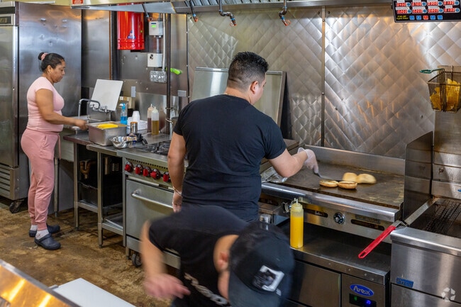 Local chefs prepare delicious mexican cuisine at Dora Taqueria in South Weymouth.