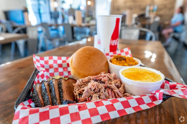 Enjoy a plate of brisket and pulled pork from the Smokin Pig Express in Williamston.