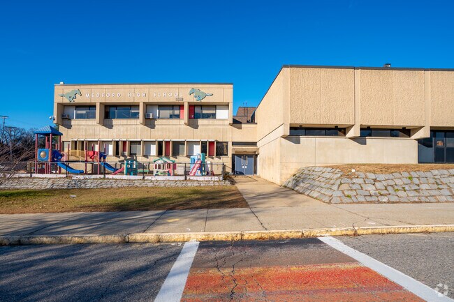 You'll find the Kids Corner entrance as you pull into the main Medford High School parking lot.
