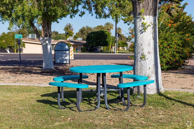 Picnic tables, grass field at Memorial Park