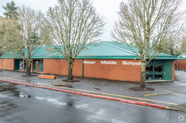 Steel letters on the brick facade of Gaiser Middle School in Vancouver, WA.