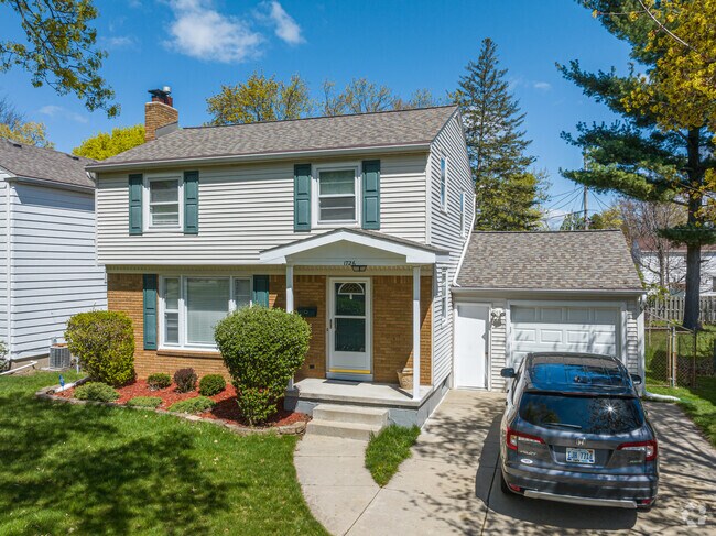 Brick Colonial-style house, across from Elmhurst Park in the Colonial Village neighborhood
