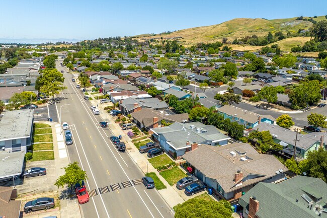 The streets closest to Mission Boulevard are lined with midcentury-era ranch homes.