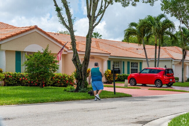 Floral Lakes resident taking a stroll around the community.