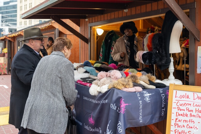 A gift and a smile is always present at the Winter Village & Holiday Market near Greenville Westchester in White Plains.