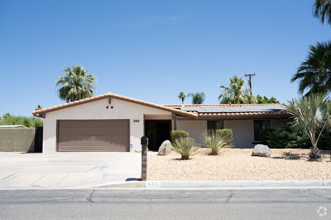 Single story Spanish style home in the cozy community of El Mirador.