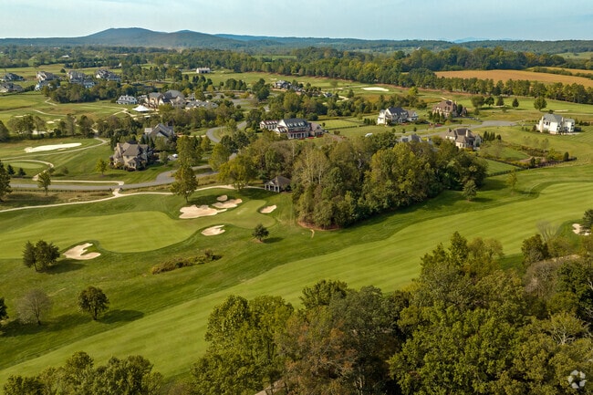 Creighton Farm homes are custom built luxury homes in a private golf course community in Aldie.