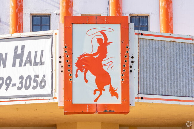 Rodeo culture in Raymondville is shown across the local signage and retail businesses in the downtown area.