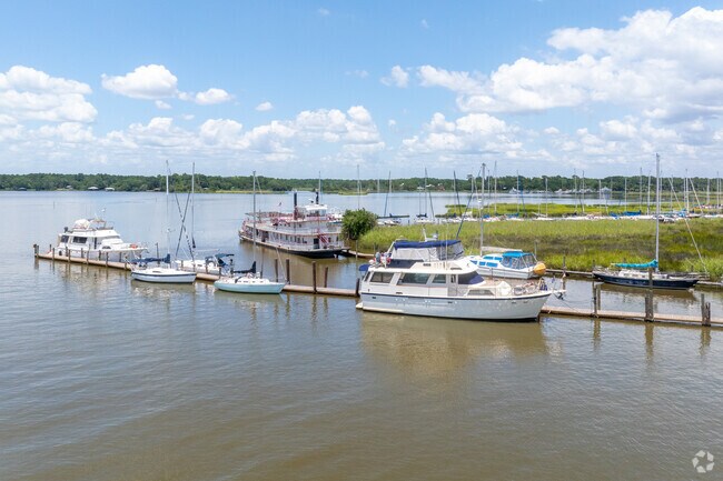 The Dog River gets deeper toward the Gulf allowing for larger boats to dock there.