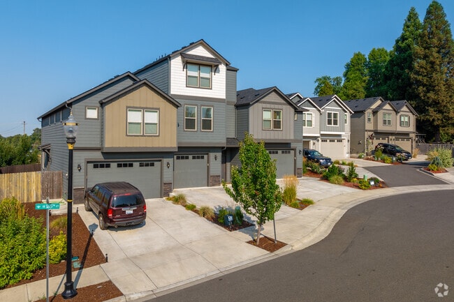Varying styles of contemporary townhomes wind their way through the Village at Fisher's Landing.