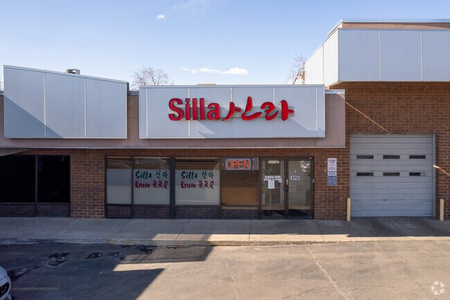 Locals flock to Silla Korean BBQ in Dam East/West for sizzling meats and bold flavors.