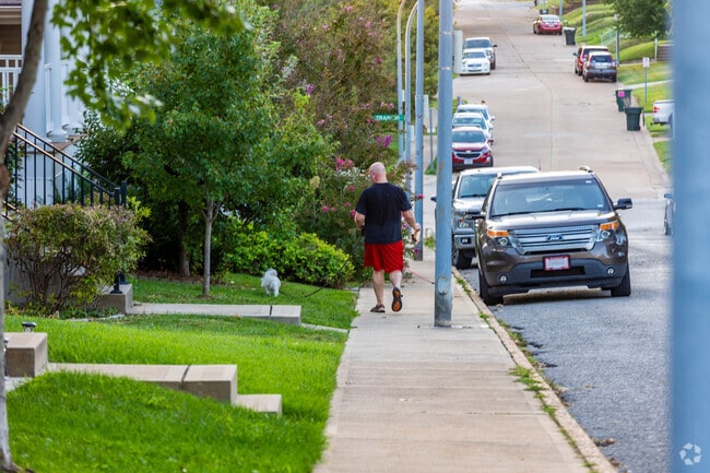Boulevard Heights residents enjoy quiet evenings walking their furry companions.