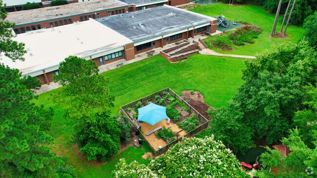 There is a community garden run by the school.