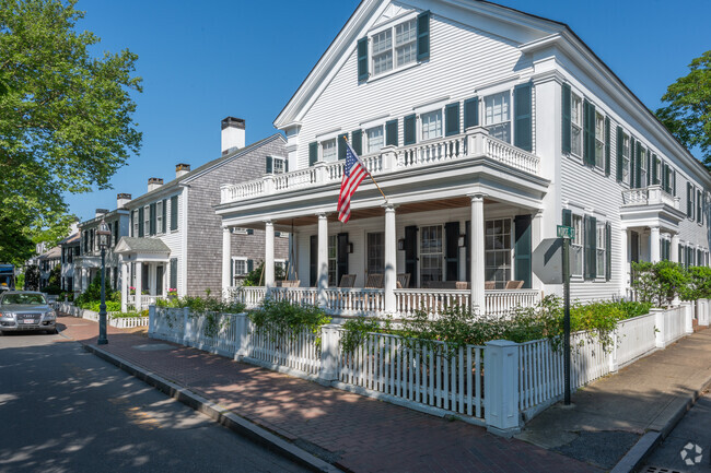 A captain's home sits at the end of a row of colonial houses in Edgartown.