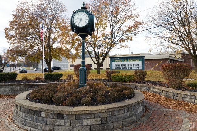 In the center of Milton you are welcomed by a time piece and place to sit.