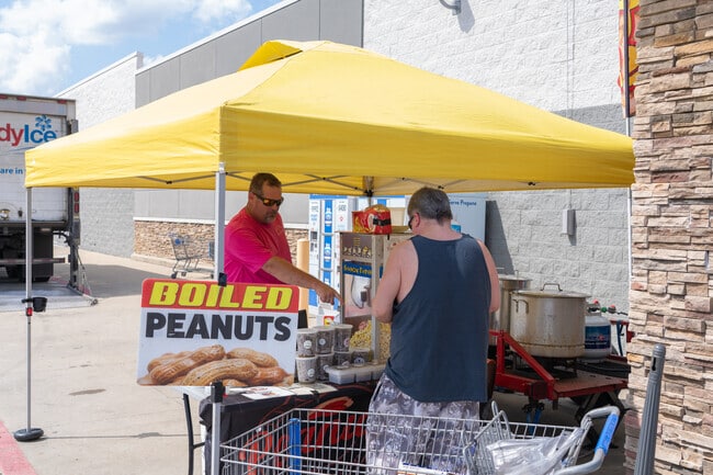 Ladonia residents are often seen selling food and products to locals.