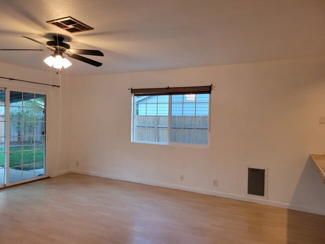 Living Room and doggy door to backyard