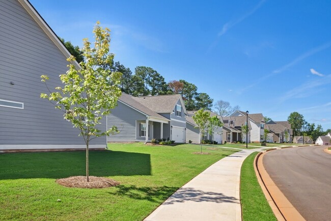 Exterior shot of Salem Oaks, two story homes with a private driveway and attached garage.
