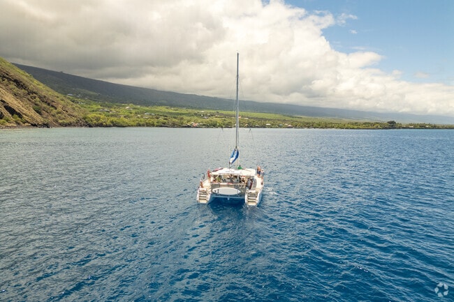 Kealakekua Bay is a popular spot for snorkeling and diving, with its crystal-clear waters.