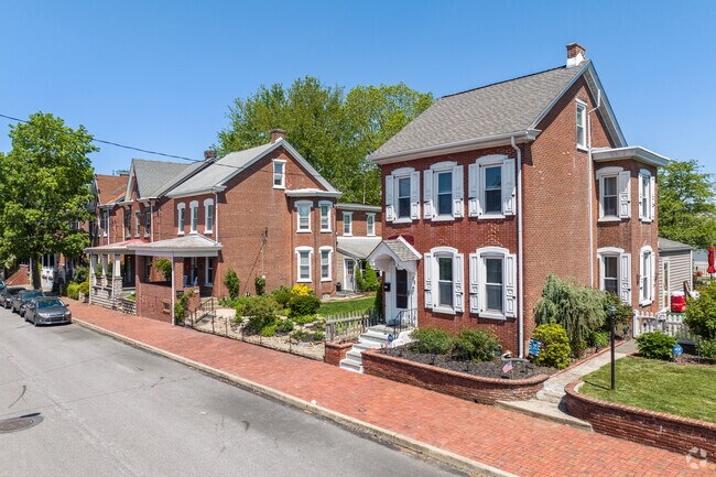 The southern streets of Manatawny-Farmington include historic brick shotgun and twin homes.