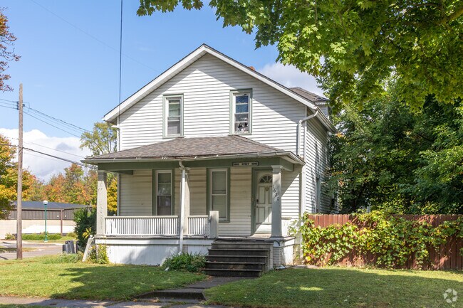 Farmhouses in Butman-Fish have tidy yards and clean lines.
