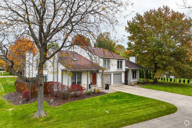 Duplex home in Sawmill Woods have plenty of yard space and driveways.
