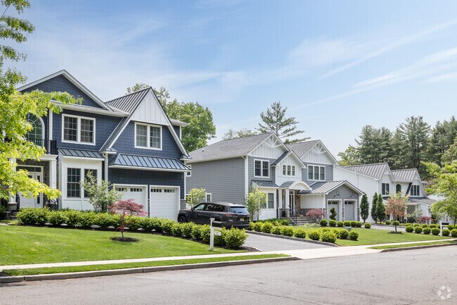 A street with new Colonial style homes in Haworth, NJ.