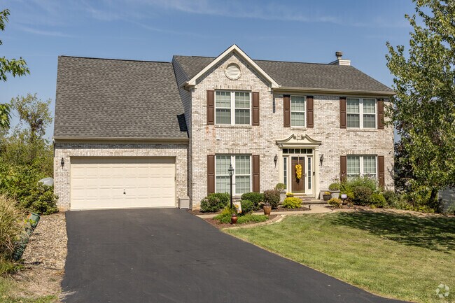 Chartiers Township houses may have large paved drive ways with small lawns in the front.