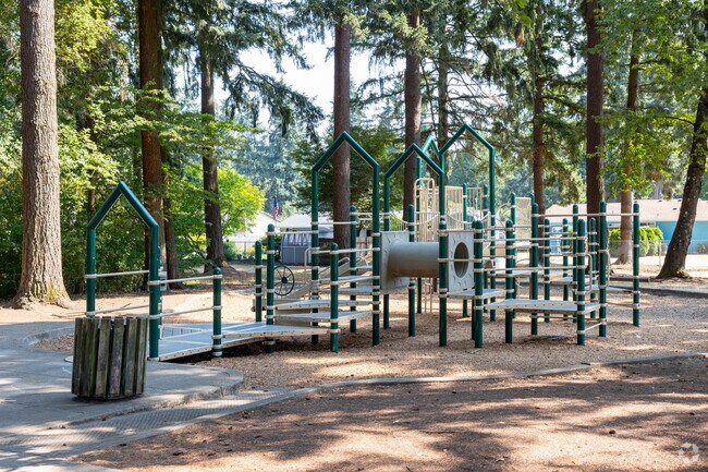 Fircrest Neighborhood Park features a small playground and open lawn on NE 5th St.